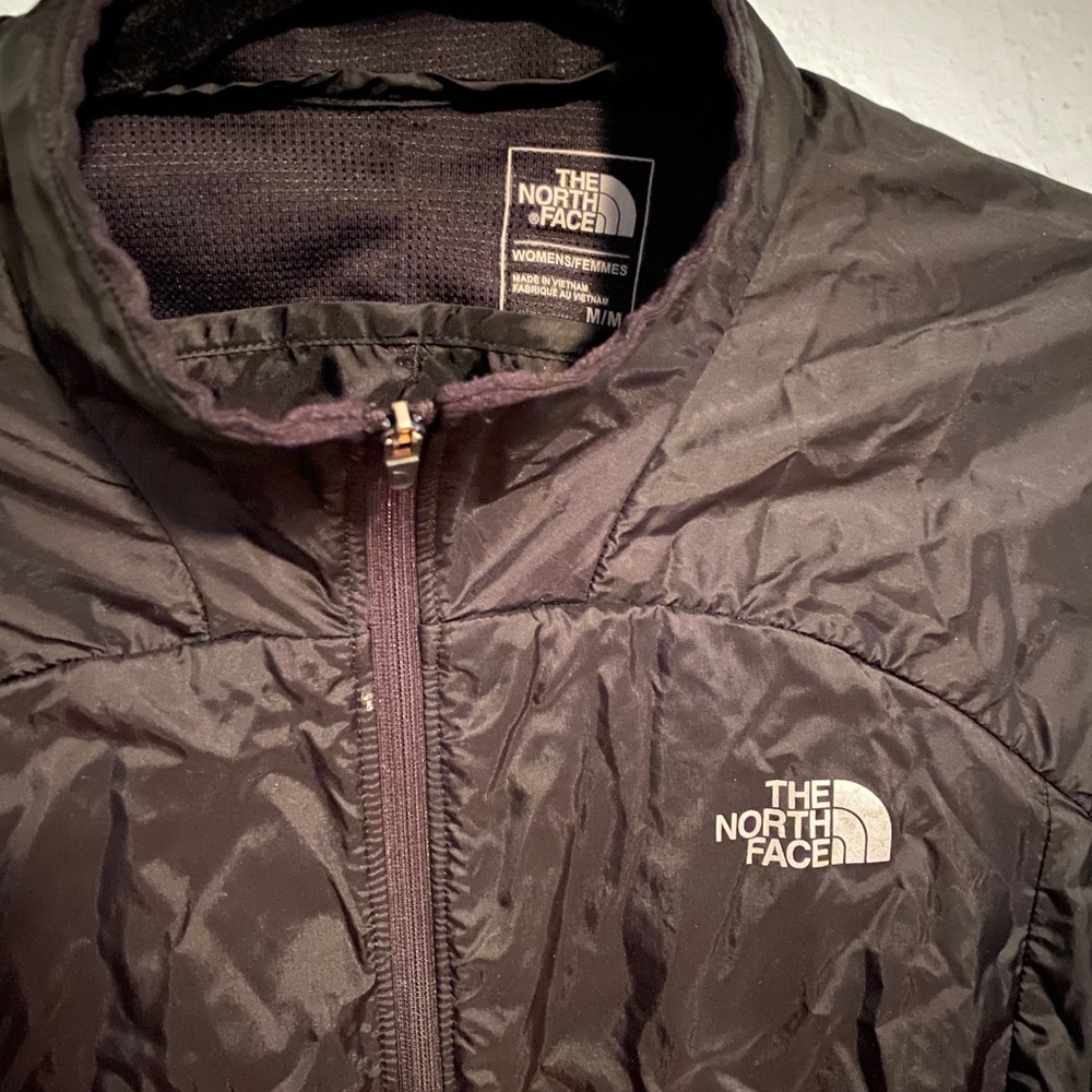 The North Face thin black windbreaker size M